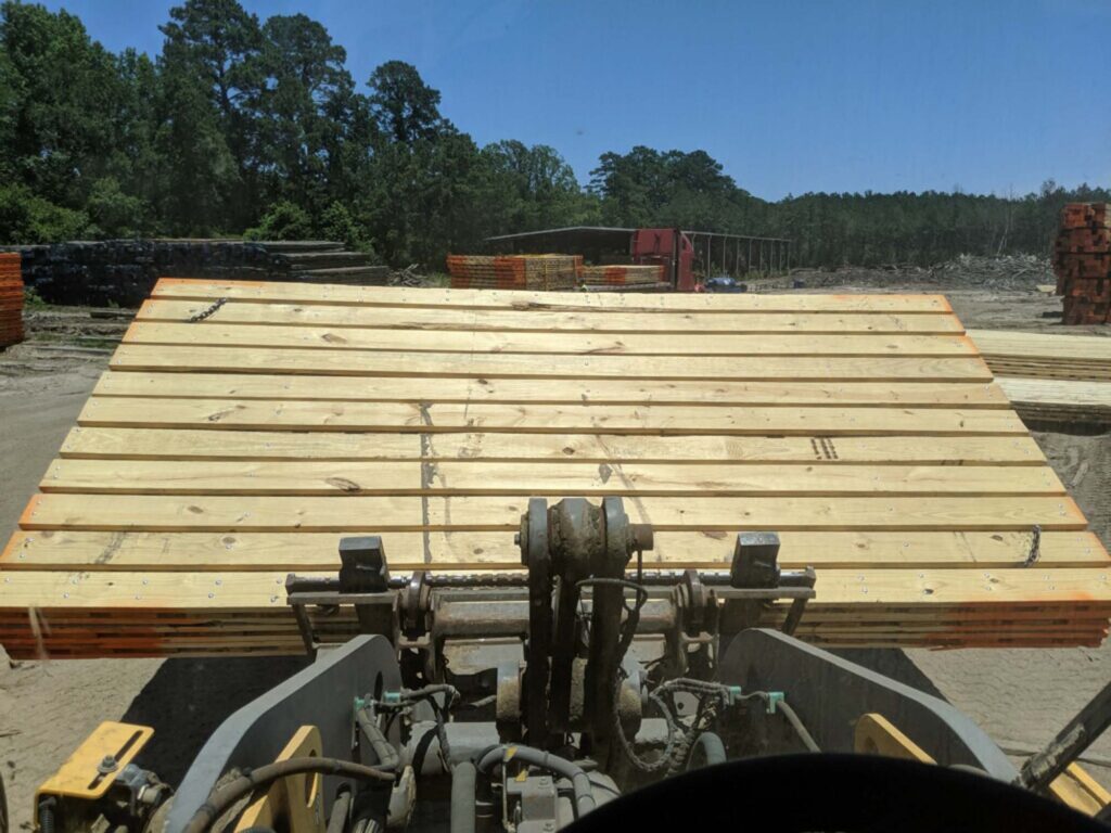 laminated mats being transported